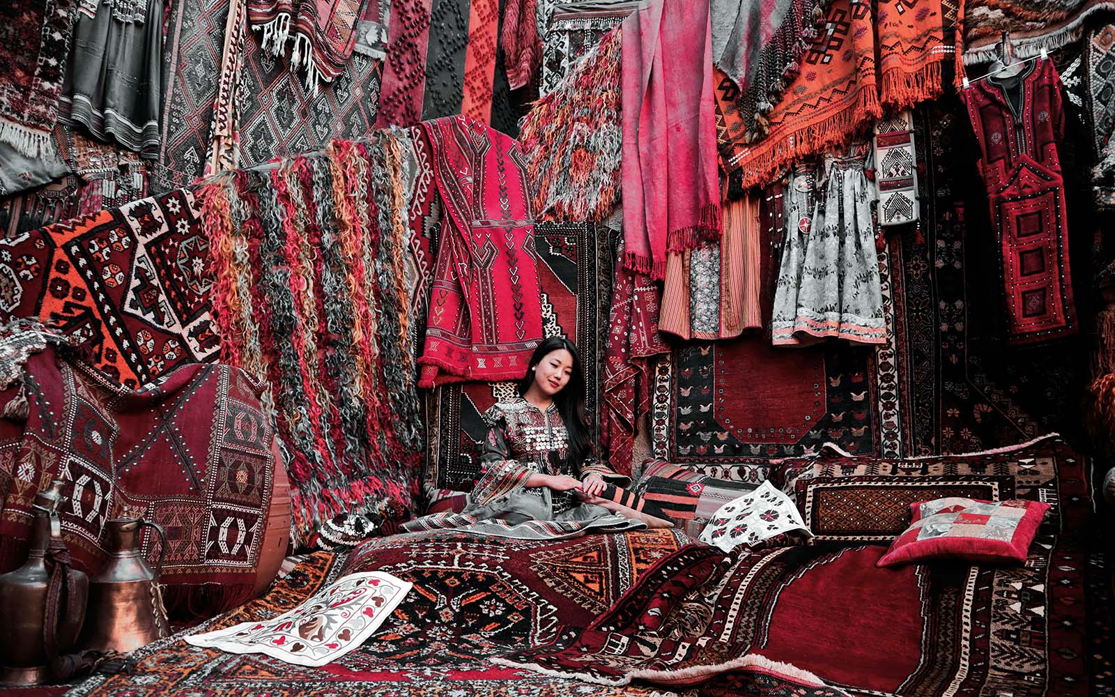 Exquisite Persian rugs with intricate patterns, adding elegance and history to a living room.