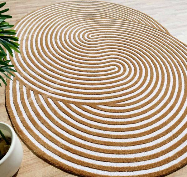 A unique shaped rug adding artistic flair to a cozy living room.