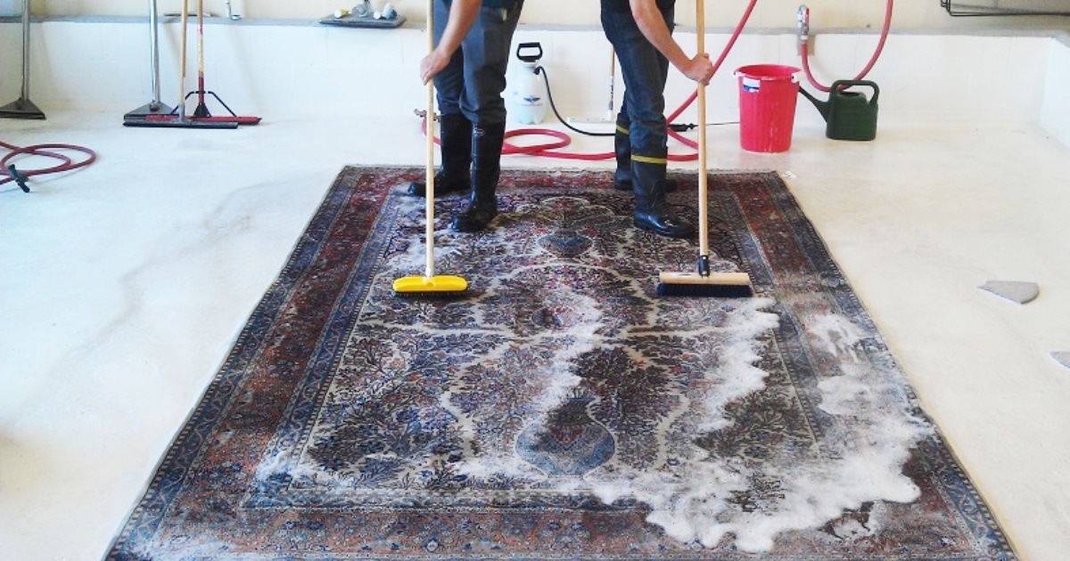 A high-end living room featuring one of our luxury washable area rugs with an intricate pattern and soft texture.