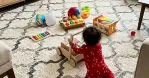 children’s room rugs in soft neutral and pastel colors creating a warm and playful kids bedroom interior