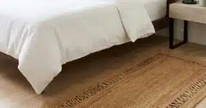 bedroom runner rugs placed beside bed in a modern cozy bedroom